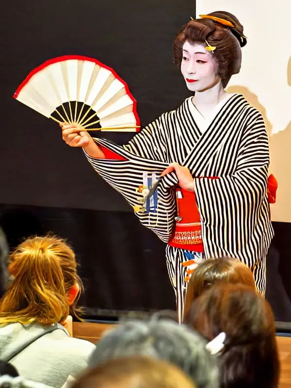 enjoy performance by a geisha